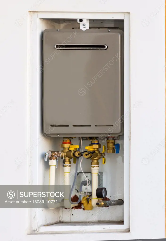 Close-up of a gas fueled water heater mounted on wall, Riviera Beach, USA. 04/03/2008