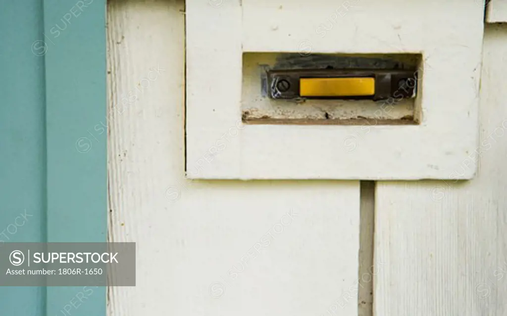 Detail of old Yellow Doorbell