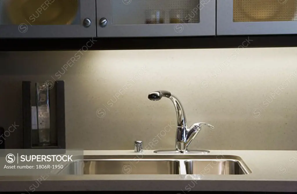 Metal Sink on Red Countertop