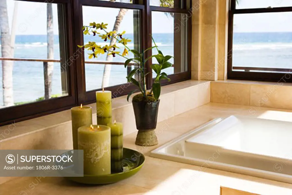 Green Candles Next to Jacuzzi Tub