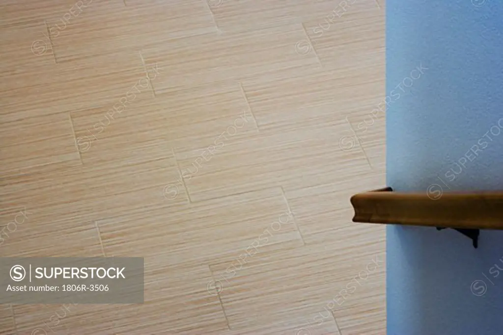 Wood Bannister and Contemporary Hardwood Flooring