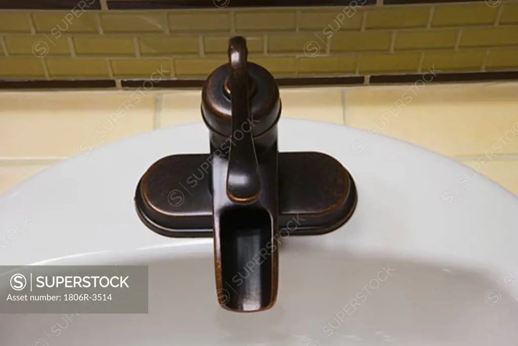 Contemporary Faucet with Green Tile Backsplash