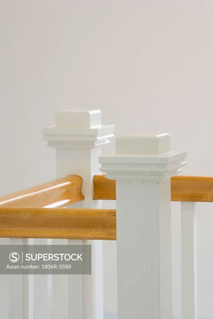 Wood Bannister and White Wood Railing