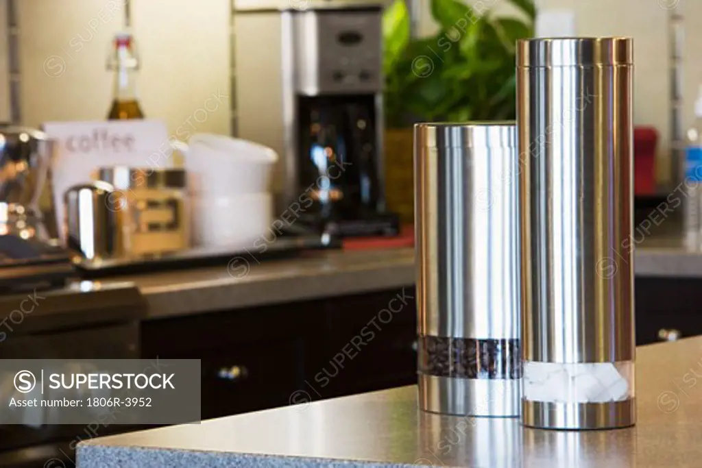 Decorative Chrome Canisters in Kitchen