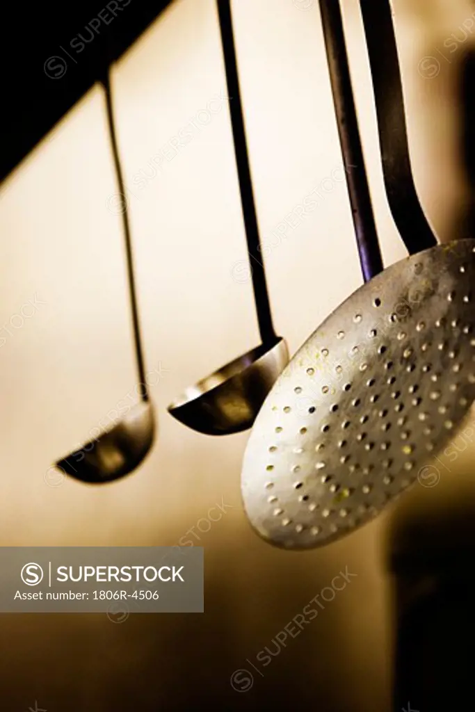 Ladles Hanging from Shelf
