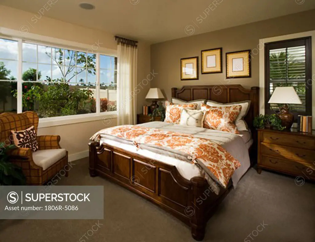 Cozy Bedroom with Orange Details