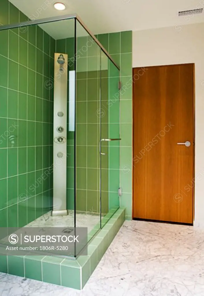 Modern Bathroom with Green Shower Tiles