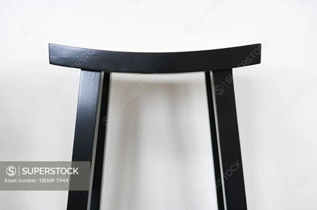 Black stool against white background