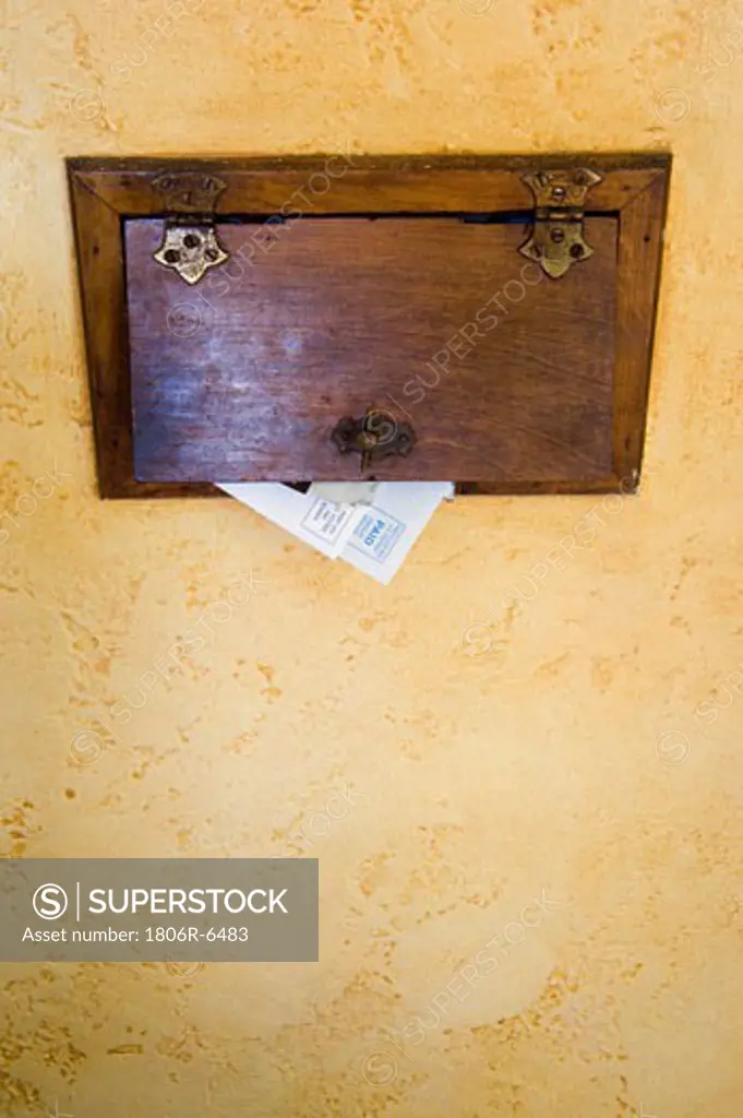 Detail of mail in mail slot.