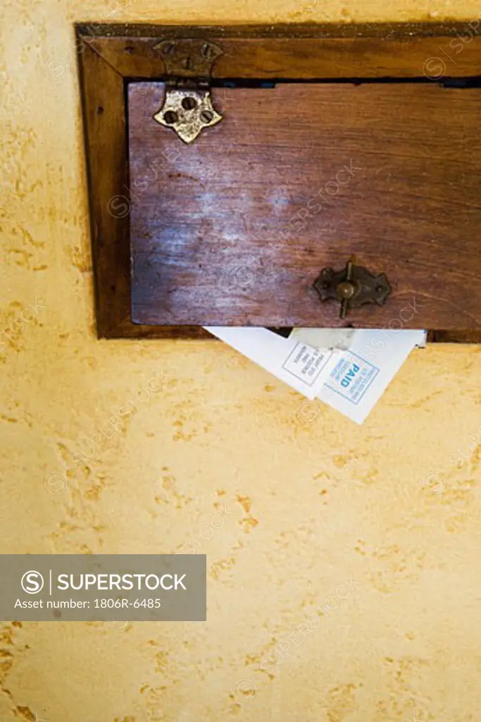 Detail of mail in mail slot.