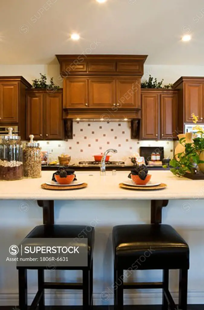 Vignette of kitchen with two barstools.