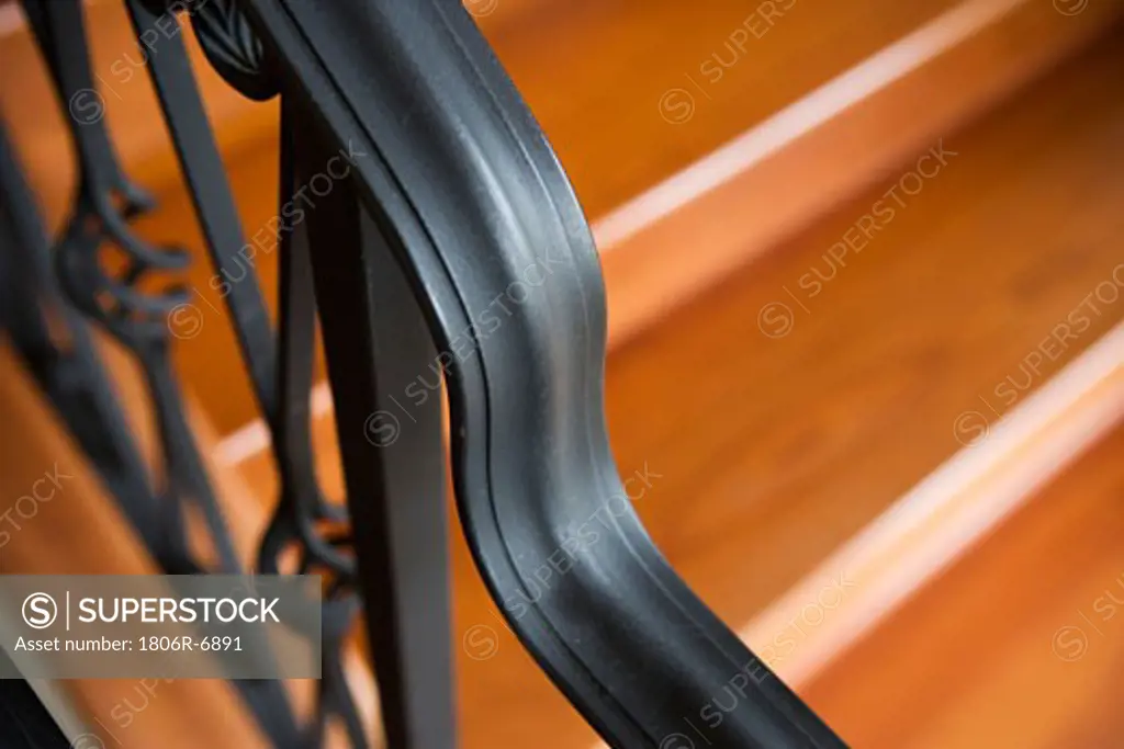 Detail of wrought iron stair railing.