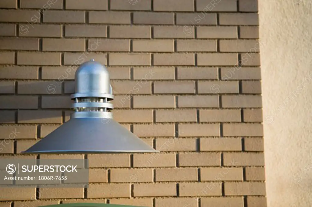industrial style exterior wall light on brick wall