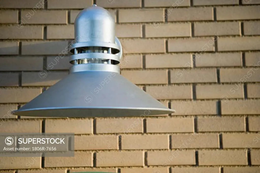 industrial style exterior wall light on brick wall