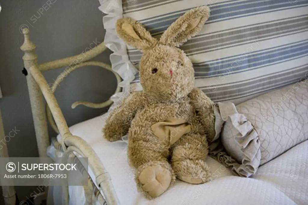 Stuffed bunny on bed