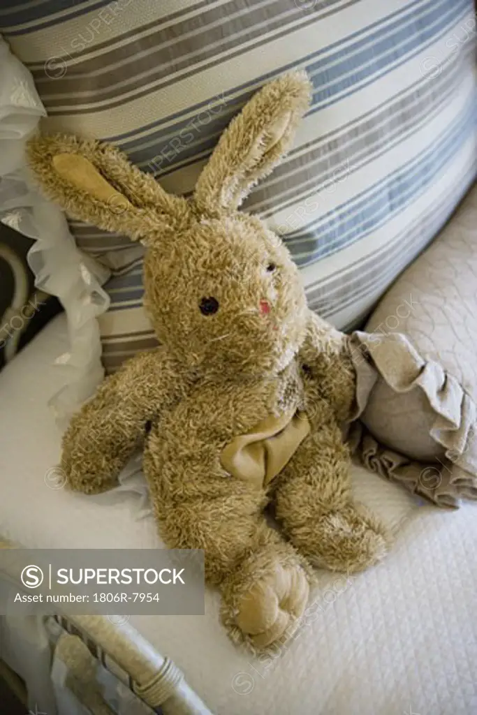 Stuffed bunny on bed