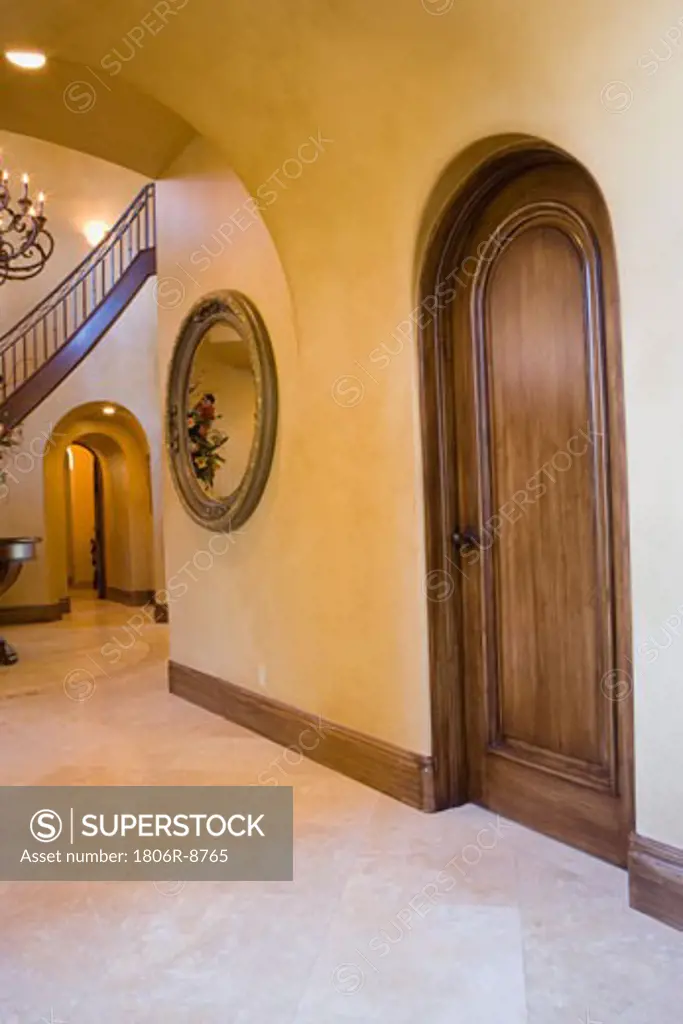 Arched Door with Foyer in Background