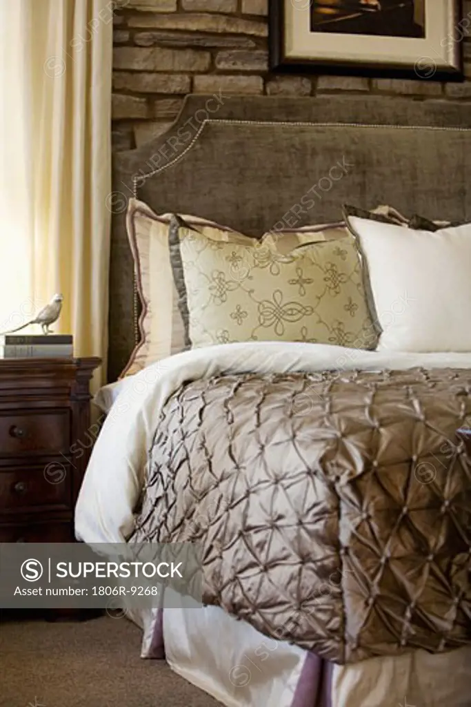 Elegant bed with velvet headboard