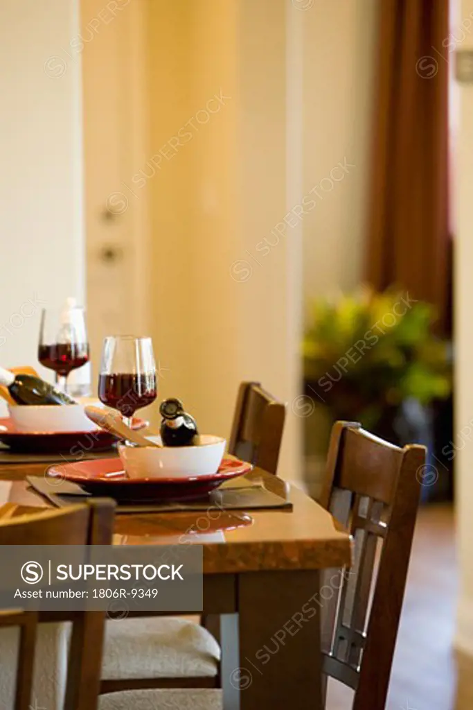 Place setting with bowl plate and wine glass