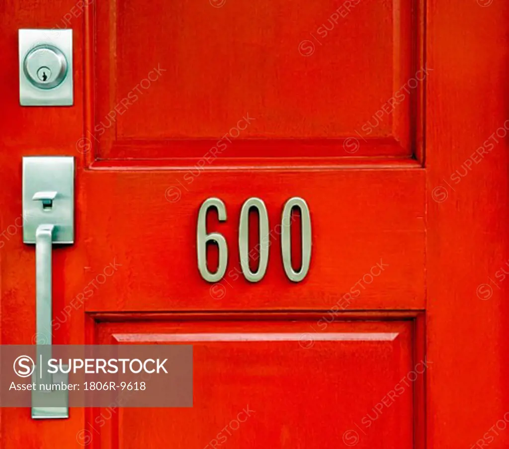 Red door with house number