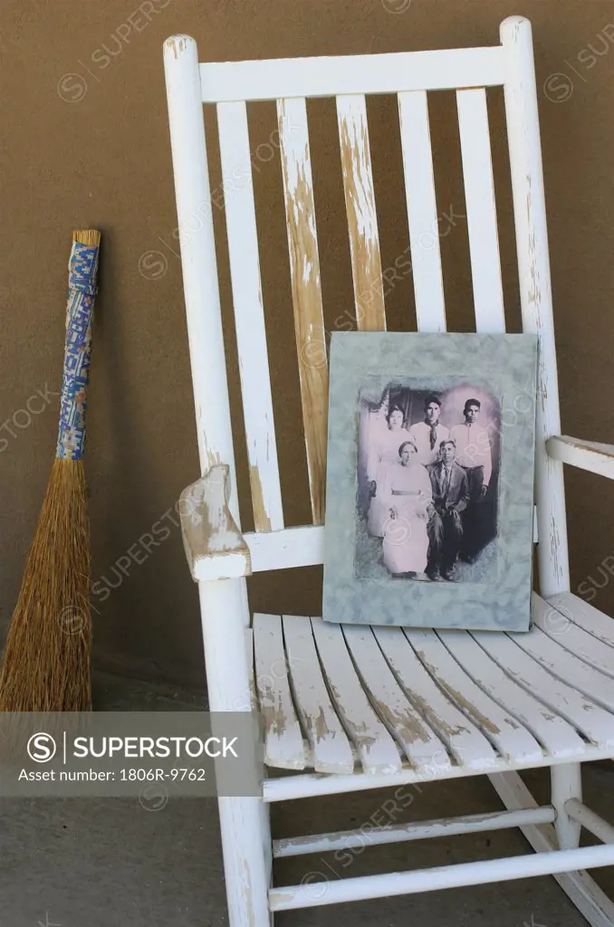 Family photo on old wooden rocker