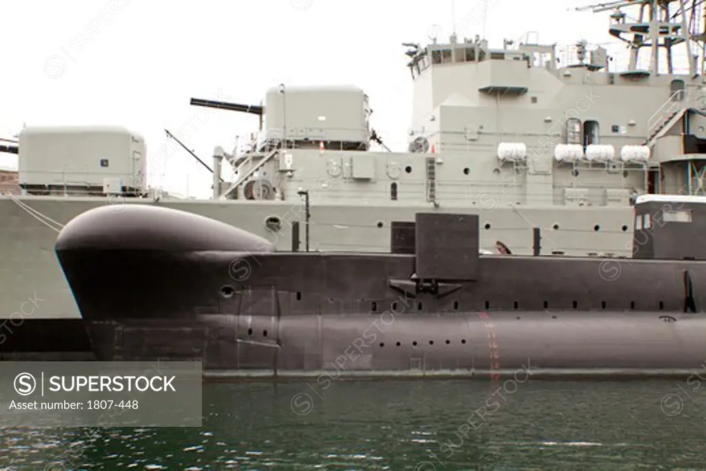 Submarine and Destroyer in port