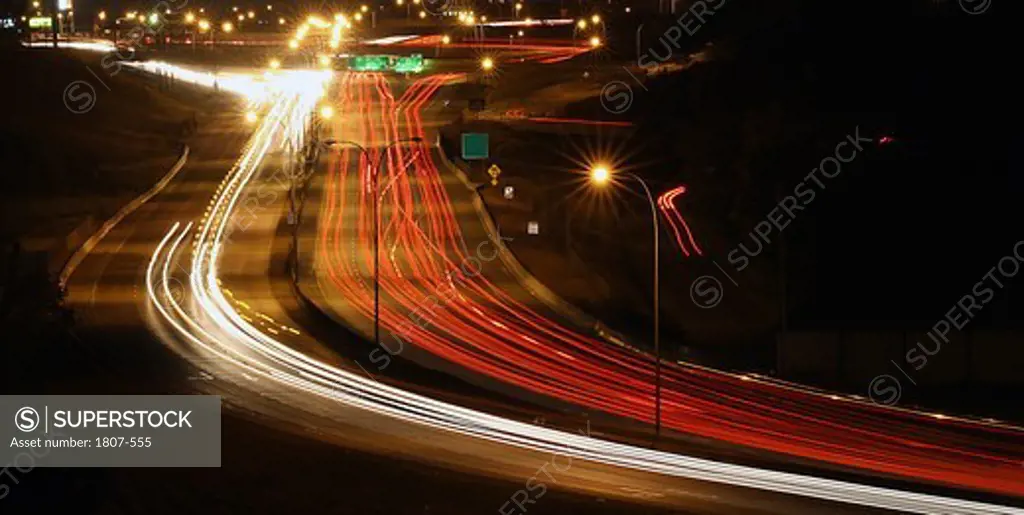 Canada, Alberta, Calgary, Highway system around metropolis by night