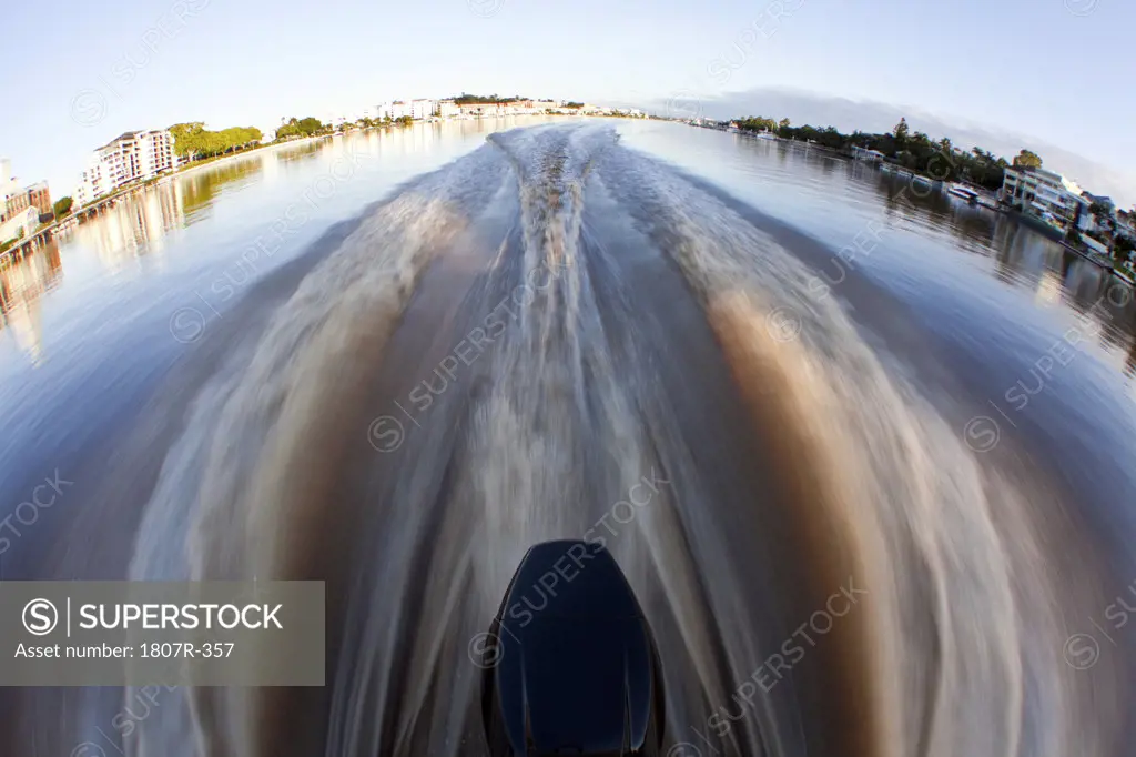Speedboat prop wash wake in the river