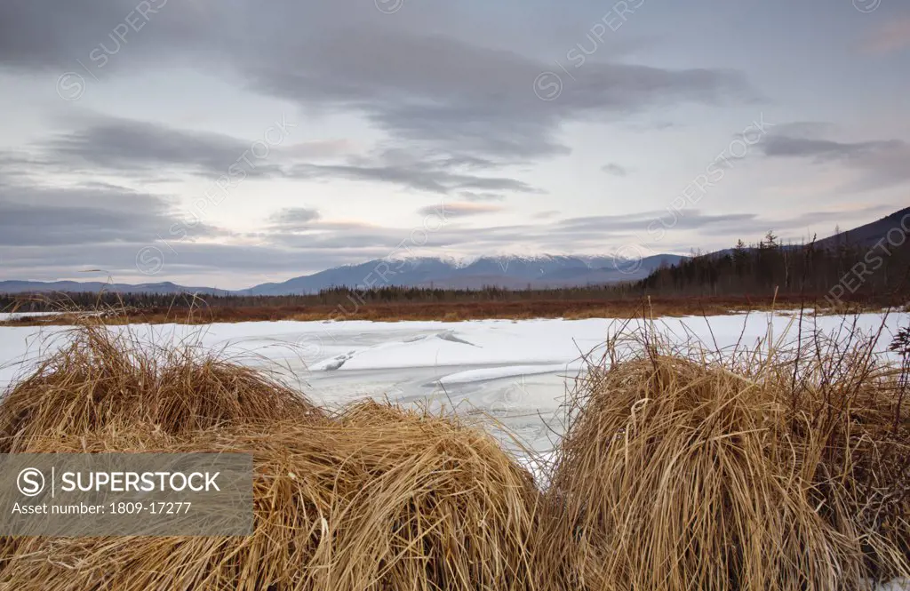 Pondicherry Wildlife Refuge - Scenic view of Presidential Range at sunset from Cherry Pond in Jefferson, New Hampshire USA during the winter months