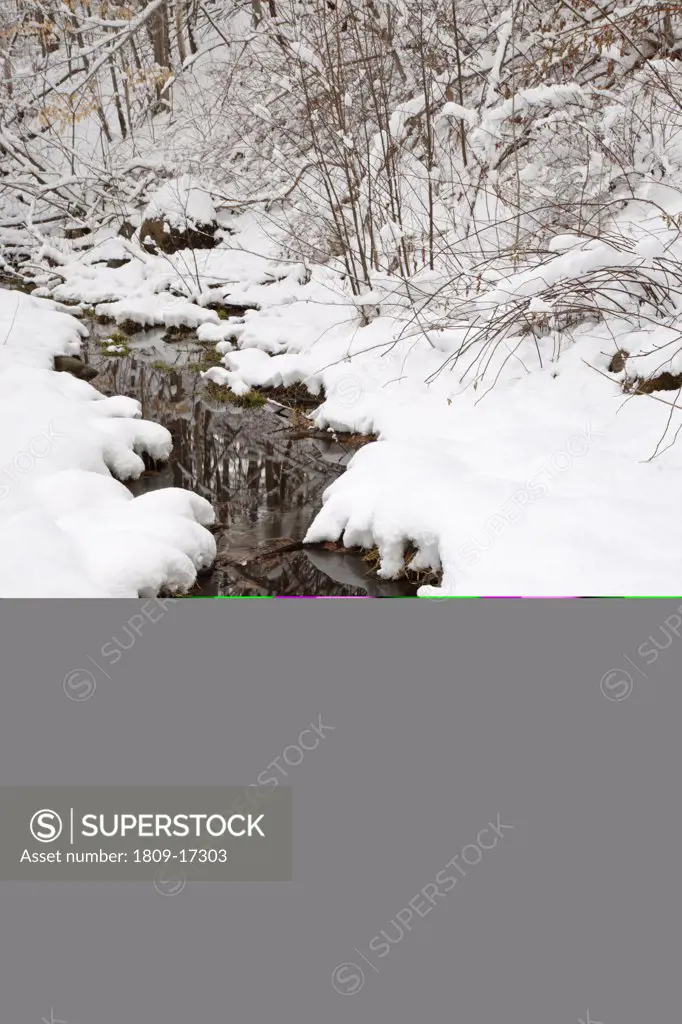 Small brook in Lincoln, New Hampshire USA after a snow storm