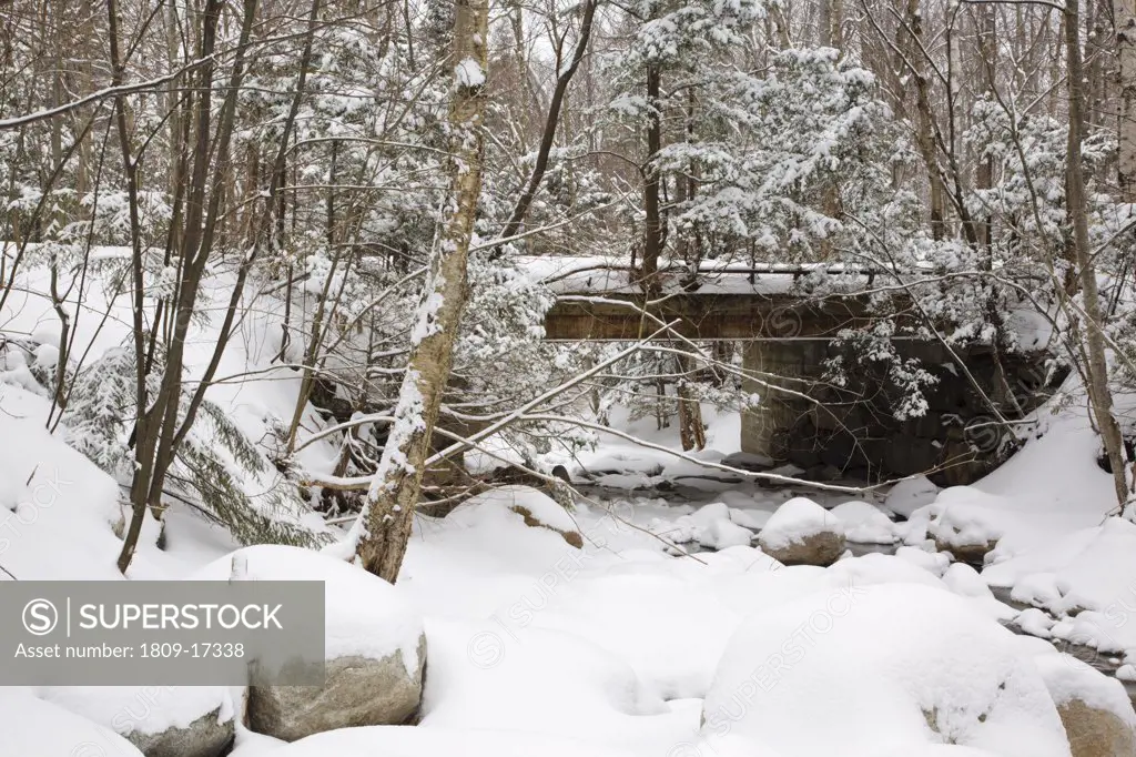 Old bridge, which crosses Lafayette Brook along the Notchway Trail. The Notchway Trail is the main trail of the Lafayette Ski Trails and follows the old Route 3 between Route 141 and Route 18 in the town of Franconia, New Hampshire