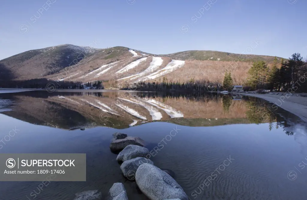 Franconia Notch State Park - Relection of Cannon Mountain in Echo Lake during the spring months in the White Mountains, New Hampshire USA