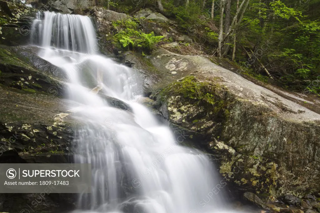 Kinsman Notch - Beaver Brook Cascades during the spring months. These cascades are located along the Appalachian Tail in the White Mountain National Forest of New Hampshire USA
