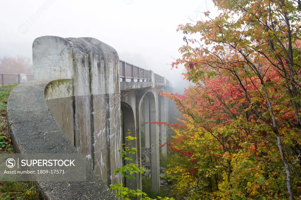 Franconia Notch State Park - The old U.S. Route 3 bridge over Lafayette Brook is closed to traffic and is part of the multi-use trail Franconia Notch Bike Path in the White Mountains, New Hampshire USA