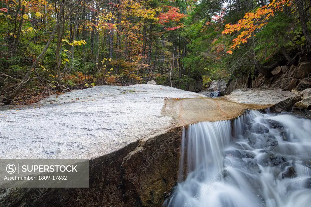 A section of rocky gorge just above the 'other' Pitcher Falls, located on the South Fork of the Hancock Branch in the White Mountains, New Hampshire USA during the autumn months
