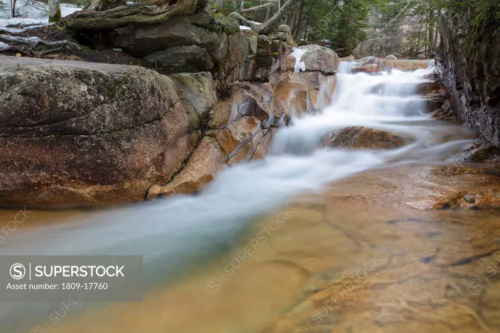 Franconia Notch State Park - The Baby Flume, which is located just below 'The Basin' viewing area along the Pemigewasset River in Lincoln, New Hampshire USA during the spring months
