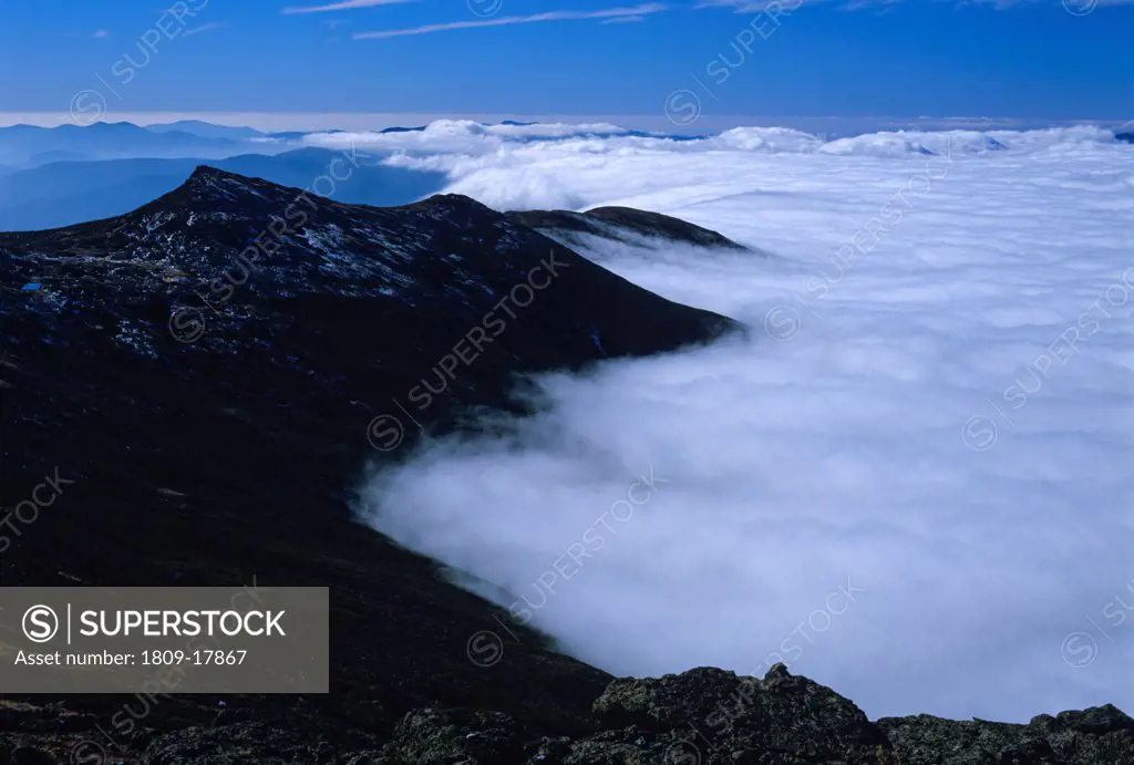 Appalachian Trail - Mount Monroe surrounded by fog in the Southern Presidential Range of the White Mountain National Forest in New Hampshire USA.