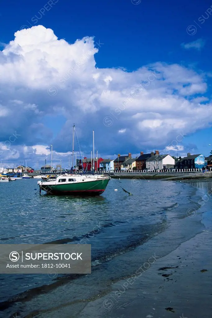 Skerries Harbour, County Dublin, Ireland, Boat near shore of coastal village