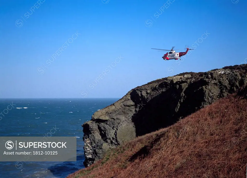 Howth Head, Co Dublin, Ireland, Air_Sea rescue helicopter flying over Howth Head