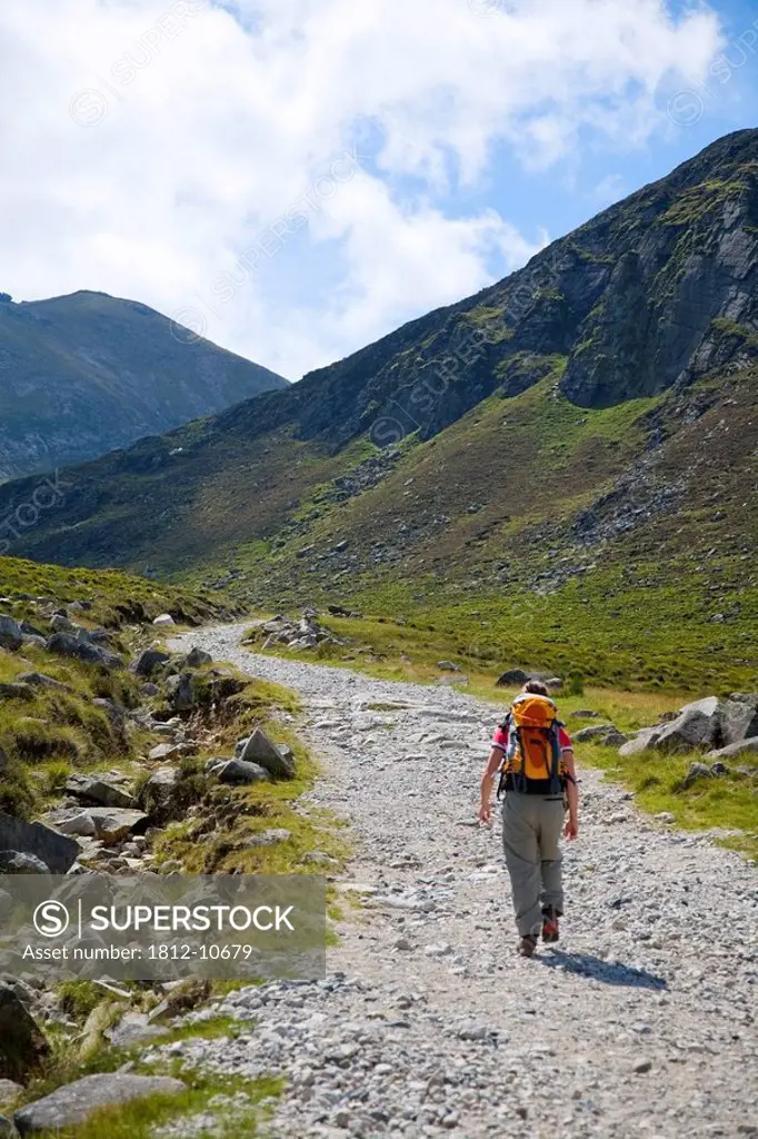 Mourne Mountains, Co Down, Ireland, Hiker on the Trassey Track