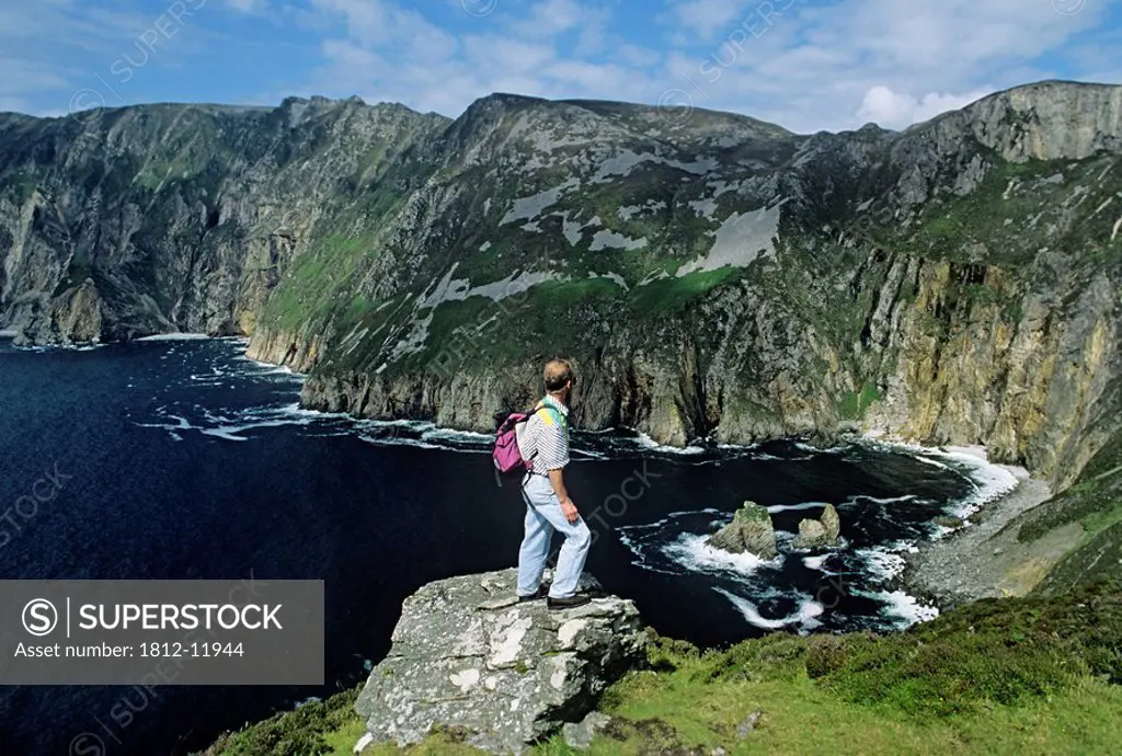 Side Profile Of A Man Standing On A Rock, Slieve League Sea Cliffs, County Donegal, Republic Of Ireland