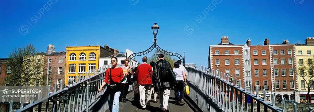 Tourists Walking On A Bridge, Ha´penny Bridge, Dublin, Republic Of Ireland