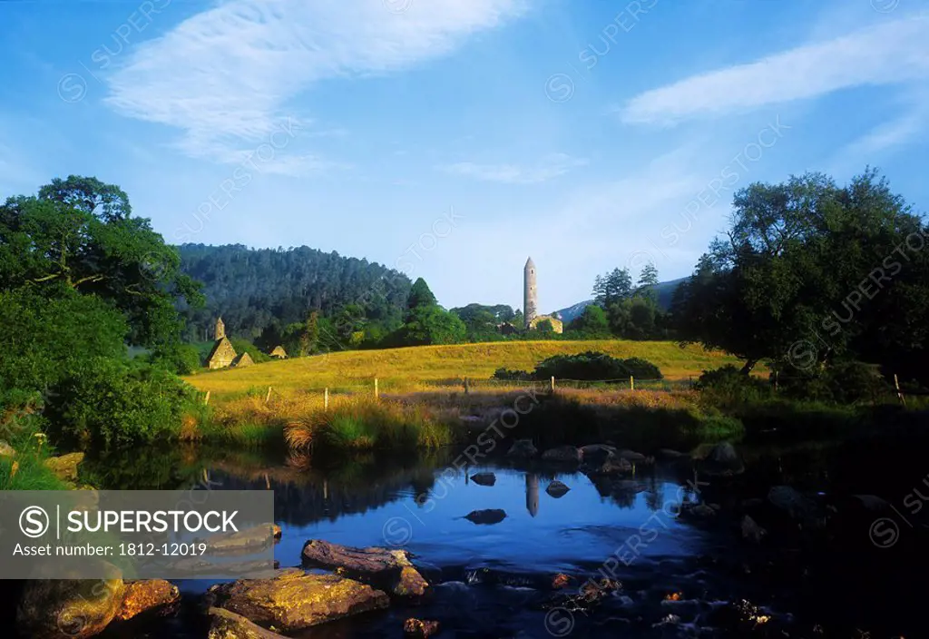 Round Tower In The Forest, Glendalough, Wicklow Mountains, Republic Of Ireland