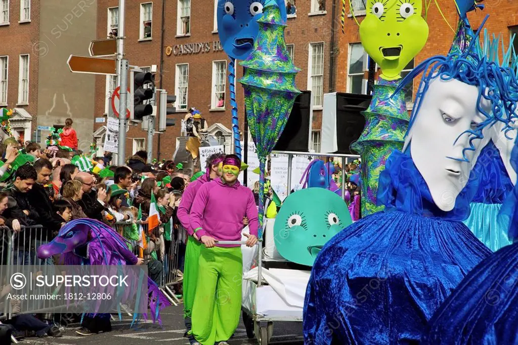 Dublin, ireland, people dress in costumes walking down o´connell street in a parade