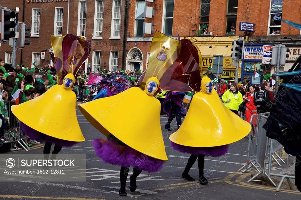 Dublin, ireland, people in costumes in a parade on o´connell street