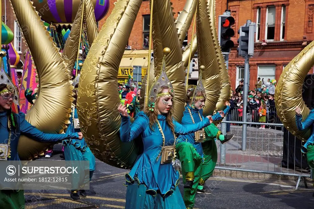 Dublin, ireland, people in costumes in a parade on o´connell street
