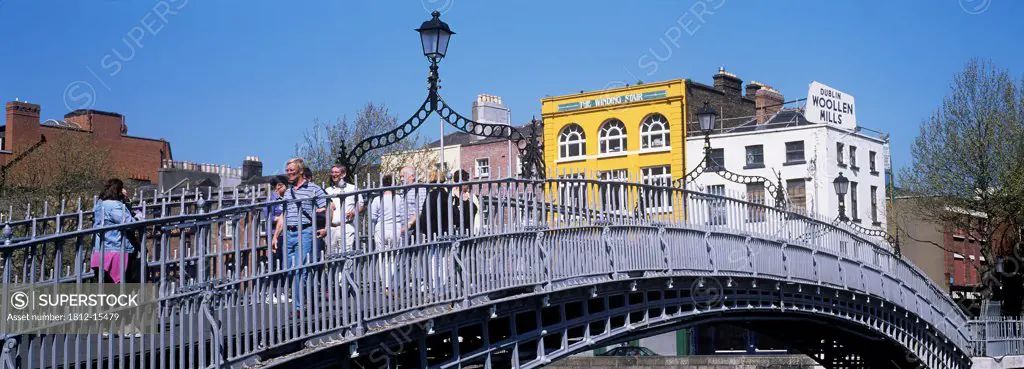 Tourists Walking On A Bridge, Ha'penny Bridge, Dublin, Republic Of Ireland