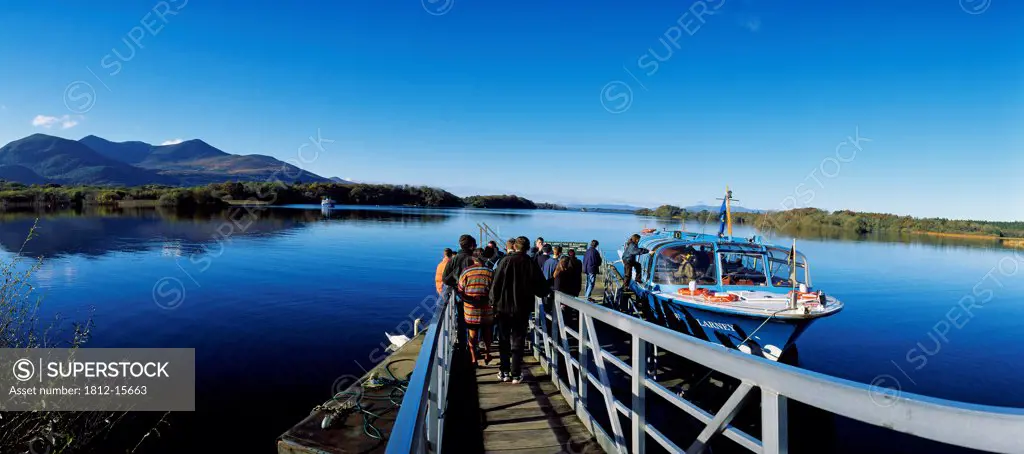 High Angle View Of Tourists On The Pier Entering The Boat In The Lake, Lakes Of Killarney, Killarney, Republic Of Ireland