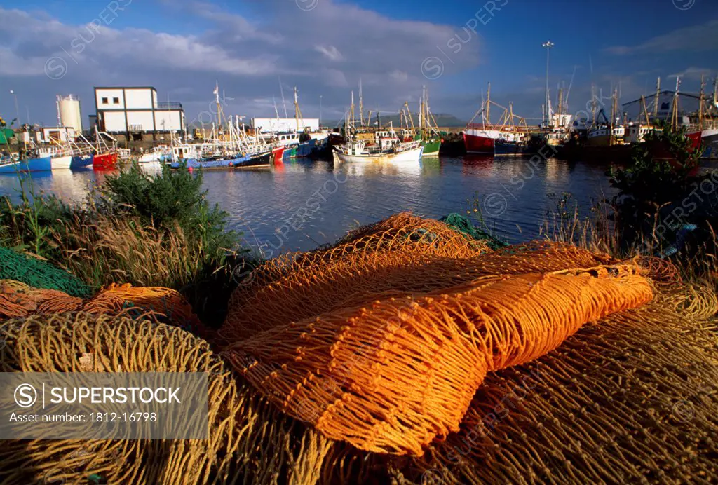 Quayside, Greencastle, County Donegal, Ireland; Fishing Nets And Boats