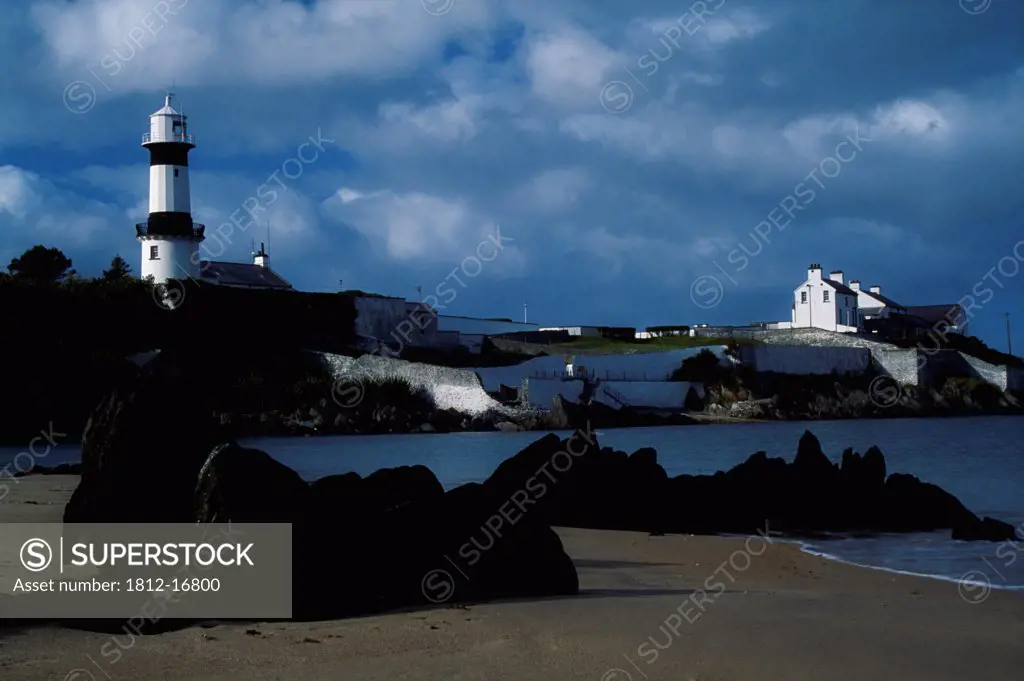 Inishowen, County Donegal, Ireland; Lighthouse And Beach Shoreline